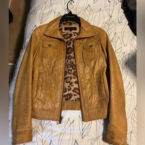 Black rivet cognac leather jacket